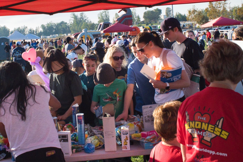 Kids playing at an outdoor carnival